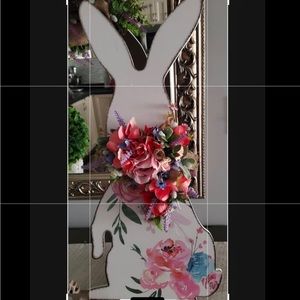 Wooden Bunny with beautiful flower arrangement.